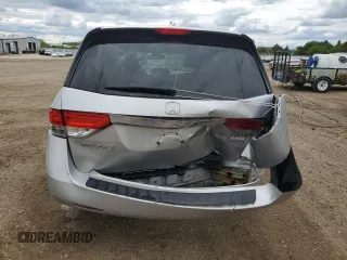 2014 Honda Odyssey LX z VIN 5FNRL5H21EB106600, wystawiony jako Copart lot #57875765 z przebiegiem 122 159 mil mil oraz Szkoda całkowita • Salvage title. Historia ofert i sprzedaży dostępna na DreamBid. Obrazek 6.