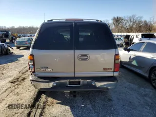2001 GMC Yukon SLT z VIN 1GKEC13T71J223368, wystawiony jako Copart lot #86610954 z przebiegiem 414 811 mil mil oraz Szkoda całkowita • Salvage title. Historia ofert i sprzedaży dostępna na DreamBid. Obrazek 6.