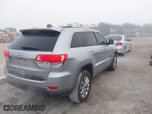 2015 Jeep Grand Cherokee Limited with VIN 1C4RJFBG5FC732732, listed as a IAAI auction lot 41478553 with 174,842 mi miles. Bid and sale history available at carsss.com. Image 4.