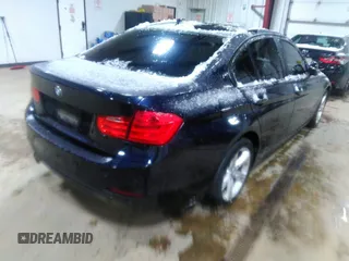 2014 BMW 3 Series 328i xDrive with VIN WBA3B3C57EF545372, listed as a IAAI auction lot 42078980 with 116,627 mi miles and . Bid and sale history available at carsss.com. Image 4.