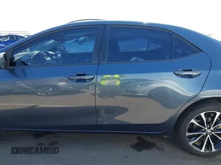 2019 Toyota Corolla L with VIN 2T1BURHE3KC207010, listed as a IAAI auction lot 42004596 with 106,188 mi miles and . Bid and sale history available at DreamBid. Image 14.