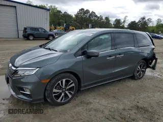 2020 Honda Odyssey Elite с VIN 5FNRL6H9XLB033176, выставлен на аукционе Copart как лот 52946185 с пробегом 57 541 миль миль и Списание • Salvage title. История ставок и продаж доступна на DreamBid. Изображение 1.