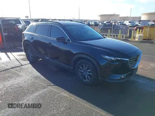 2020 Mazda CX-9 Touring z VIN JM3TCACY1L0400026, wystawiony jako IAAI lot #41722161 z przebiegiem 73 184 mil mil oraz . Historia ofert i sprzedaży dostępna na DreamBid. Obrazek 1.