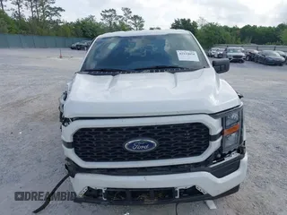 2023 Ford F-150 XL with VIN 1FTEX1CP9PKF91606, listed as a IAAI auction lot 42124058 with 23,535 mi miles and . Bid and sale history available at DreamBid. Image 12.