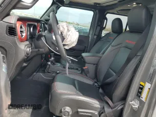 2023 Jeep Wrangler Rubicon with VIN 1C4JJXFG4PW523432, listed as a Copart auction lot 51642975 with 23,631 mi miles and Salvage title. Bid and sale history available at DreamBid. Image 7.