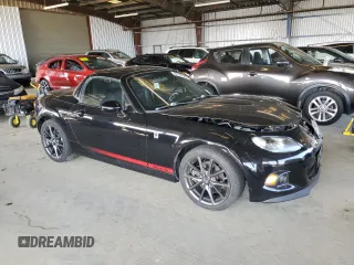 2014 Mazda MX-5 Miata Club with VIN JM1NC2MF0E0235061, listed as a Copart auction lot 62741565 with 63,767 mi miles and Salvage title. Bid and sale history available at DreamBid. Image 4.