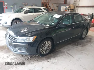 2016 Volkswagen Passat SE z VIN 1VWBT7A38GC010301, wystawiony jako IAAI lot #42316812 z przebiegiem 154 618 mil mil oraz . Historia ofert i sprzedaży dostępna na DreamBid. Obrazek 2.