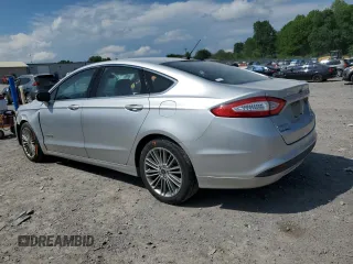 2013 Ford Fusion SE Hybrid z VIN 3FA6P0LU3DR336838, wystawiony jako Copart lot #56205445 z przebiegiem 209 164 mil mil oraz Czysty tytuł • Clean title. Historia ofert i sprzedaży dostępna na DreamBid. Obrazek 2.