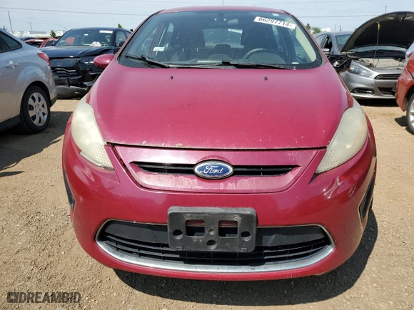 2011 Ford Fiesta SE with VIN 3FADP4EJ7BM108577, listed as a Copart auction lot 66297714 with 136,344 mi miles and Clean Title. Bid and sale history available at carsss.com. Image 5.