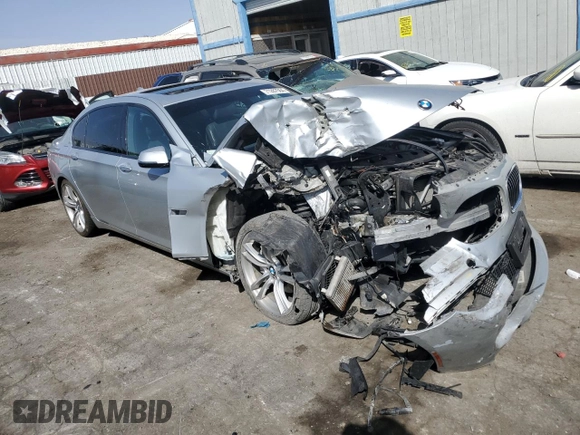 2015 BMW 7 Series 740Li with VIN WBAYE4C52FD947168, listed as a Copart auction lot 71287564 with 103,444 mi miles and Salvage Title. Bid and sale history available at DreamBid. Image 4.
