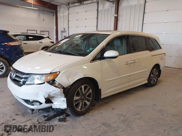 2015 Honda Odyssey Touring Elite with VIN 5FNRL5H97FB060060, listed as a IAAI auction lot 41829864 with Not Provided miles and . Bid and sale history available at DreamBid. Image 16.