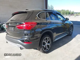 2018 BMW X1 xDrive28i z VIN WBXHT3C35J5L25056, wystawiony jako IAAI lot #42185474 z przebiegiem 62 631 mil mil oraz . Historia ofert i sprzedaży dostępna na DreamBid. Obrazek 4.