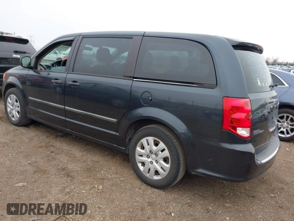 2014 Dodge Grand Caravan American Value with VIN 2C4RDGBG9ER463136, listed as a IAAI auction lot 41968032 with 184,138 mi miles and . Bid and sale history available at DreamBid. Image 3.