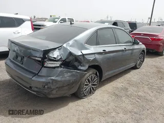 2021 Volkswagen Jetta S z VIN 3VWC57BU0MM032910, wystawiony jako IAAI lot #41836545 z przebiegiem 64 042 mil mil oraz . Historia ofert i sprzedaży dostępna na DreamBid. Obrazek 4.