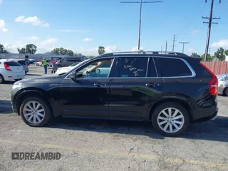 2016 Volvo XC90 T6 Momentum z VIN YV4A22PK7G1069884, wystawiony jako IAAI lot #42247951 z przebiegiem 116 640 mil mil oraz . Historia ofert i sprzedaży dostępna na DreamBid. Obrazek 14.