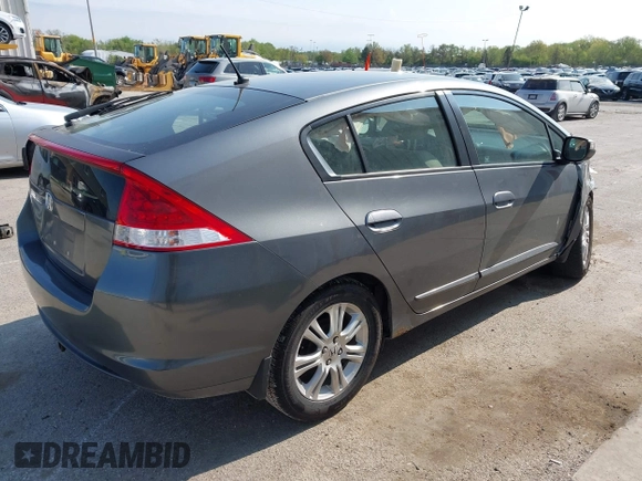 2011 Honda Insight EX with VIN JHMZE2H7XBS006254, listed as a IAAI auction lot 42222213 with 244,078 mi miles and . Bid and sale history available at DreamBid. Image 4.
