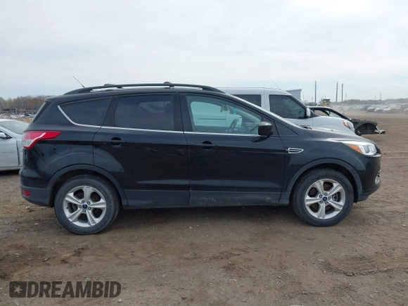 2016 Ford Escape SE with VIN 1FMCU9G98GUA63081, listed as a IAAI auction lot 42101978 with 199,468 mi miles and . Bid and sale history available at DreamBid. Image 13.