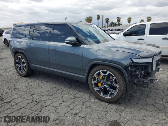 2022 Rivian R1S Launch Edition z VIN 7PDSGABL5NN001018, wystawiony jako Copart lot #56914725 z przebiegiem 26 156 mil mil oraz Szkoda całkowita • Salvage title. Historia ofert i sprzedaży dostępna na DreamBid. Obrazek 4.