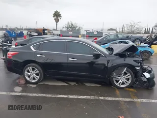 2013 Nissan Altima SV with VIN 1N4BL3AP1DC233215, listed as a IAAI auction lot 41770839 with Not Provided miles and . Bid and sale history available at DreamBid. Image 13.