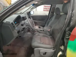 2006 Jeep Grand Cherokee Laredo with VIN 1J4GR48K56C298001, listed as a Copart auction lot 50056945 with 180,274 mi miles and Salvage Title. Bid and sale history available at carsss.com. Image 7.