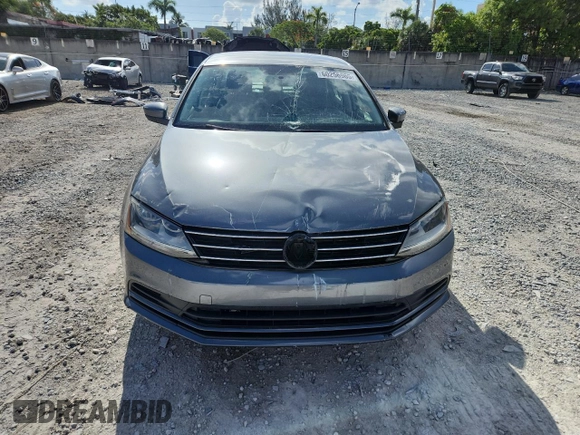 2017 Volkswagen Jetta S with VIN 3VW2B7AJ9HM344306, listed as a Copart auction lot 60256965 with 23,055 mi miles and Salvage title. Bid and sale history available at DreamBid. Image 5.