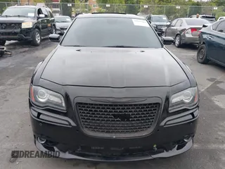 2013 Chrysler 300 SRT-8 with VIN 2C3CCAFJ9DH576184, listed as a IAAI auction lot 42162364 with 104,021 mi miles and . Bid and sale history available at carsss.com. Image 13.