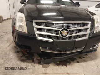 2011 Cadillac CTS Performance z VIN 1G6DL1ED3B0100075, wystawiony jako IAAI lot #41392627 z przebiegiem 124 775 mil mil oraz . Historia ofert i sprzedaży dostępna na DreamBid. Obrazek 6.