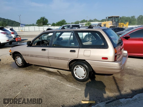 1993 Ford Escort with VIN 1FAPP15J5PW333034, listed as a Copart auction lot 56704265 with 86,691 mi miles and Non repairable. Bid and sale history available at DreamBid. Image 2.