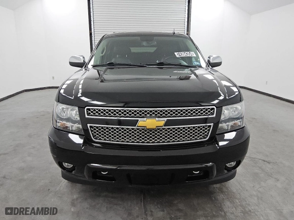 2013 Chevrolet Suburban LTZ with VIN 1GNSKKE79DR371333, listed as a Copart auction lot 74394354 with 165,171 mi miles and Clean Title. Bid and sale history available at carsss.com. Image 5.