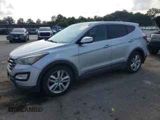 2013 Hyundai Santa Fe Sport z VIN 5XYZWDLAXDG064449, wystawiony jako Copart lot #59760505 z przebiegiem 156 901 mil mil oraz Czysty tytuł • Clean title. Historia ofert i sprzedaży dostępna na DreamBid. Obrazek 1.