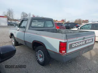 1988 Dodge D/W 100 with VIN 1B7FD04X9JS676023, listed as a IAAI auction lot 40746708 with 98,215 mi miles. Bid and sale history available at carsss.com. Image 3.