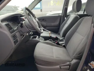 2001 Chevrolet Tracker z VIN 2CNBJ13C616955326, wystawiony jako Copart lot #64105184 z przebiegiem 138 156 mil mil oraz Tytuł czysty. Historia ofert i sprzedaży dostępna na DreamBid. Obrazek 7.