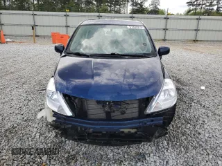 2012 Nissan Versa S with VIN 3N1BC1CP0CK202738, listed as a Copart auction lot 51839215 with 154,584 mi miles and Salvage Title. Bid and sale history available at carsss.com. Image 5.