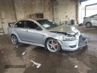 2015 Mitsubishi Lancer ES with VIN JA32U2FU9FU004812, listed as a IAAI auction lot 42330605 with 99,092 mi miles and . Bid and sale history available at DreamBid. Image 1.