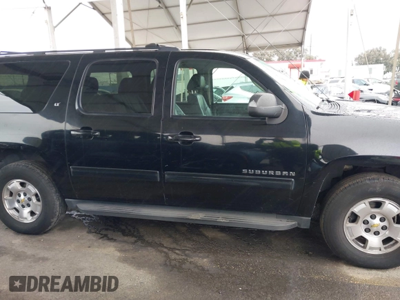 2011 Chevrolet Suburban LT with VIN 1GNSCJE01BR327933, listed as a IAAI auction lot 41813011 with 279,627 mi miles. Bid and sale history available at carsss.com. Image 13.
