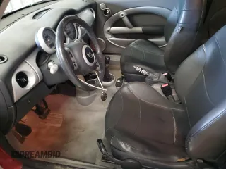2002 MINI Hardtop with VIN WMWRC33452TC35333, listed as a Copart auction lot 44447425 with 166,353 mi miles and Salvage Title. Bid and sale history available at DreamBid. Image 7.