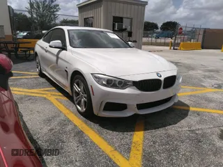 2014 BMW 4 Series 428i z VIN WBA3N3C58EF712765, wystawiony jako IAAI lot #41556781 z przebiegiem 73 901 mil mil oraz . Historia ofert i sprzedaży dostępna na DreamBid. Obrazek 1.
