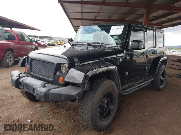 2008 Jeep Wrangler Unlimited Sahara with VIN 1J8GA59128L542384, listed as a IAAI auction lot 42184176 with 152,768 mi miles and . Bid and sale history available at DreamBid. Image 17.