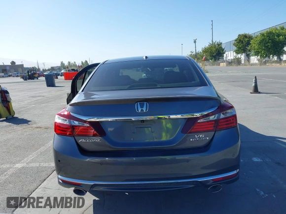2017 Honda Accord Touring with VIN 1HGCR3F97HA030310, listed as a IAAI auction lot 42539852 with 64,849 mi miles and . Bid and sale history available at DreamBid. Image 16.