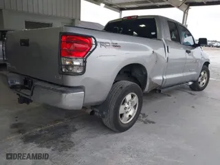 2007 Toyota Tundra SR5 with VIN 5TBBT541X7S453008, listed as a IAAI auction lot 41380611 with 153,181 mi miles. Bid and sale history available at carsss.com. Image 4.