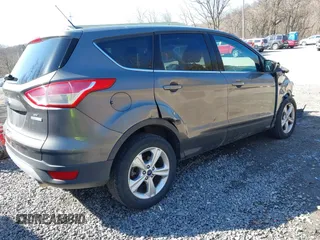 2014 Ford Escape SE z VIN 1FMCU0G99EUB25967, wystawiony jako IAAI lot #41805970 z przebiegiem 72 770 mil mil oraz . Historia ofert i sprzedaży dostępna na DreamBid. Obrazek 4.