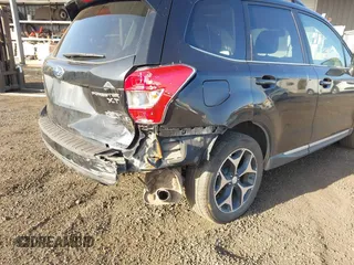 2015 Subaru Forester 2.0XT Touring with VIN JF2SJGUC0FH516972, listed as a IAAI auction lot 41483033 with 103,970 mi miles. Bid and sale history available at carsss.com. Image 6.