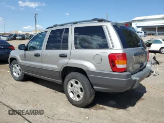 2001 Jeep Grand Cherokee Laredo with VIN 1J4GW48S91C580921, listed as a Copart auction lot 59005625 with 163,827 mi miles and Salvage title. Bid and sale history available at DreamBid. Image 2.