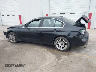 2014 BMW 3 Series 328i xDrive with VIN WBA3B5G56ENS06534, listed as a IAAI auction lot 41549553 with 165,779 mi miles and . Bid and sale history available at DreamBid. Image 14.