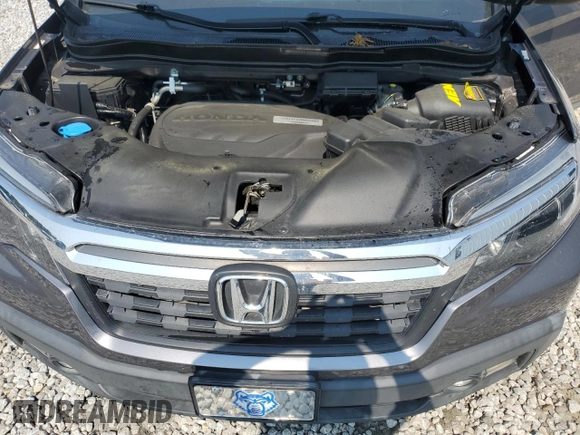 2017 Honda Ridgeline RTL-T with VIN 5FPYK2F69HB010616, listed as a Copart auction lot 58718625 with 113,047 mi miles and Salvage title. Bid and sale history available at DreamBid. Image 11.