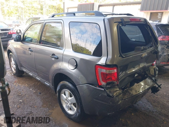 2010 Ford Escape XLT with VIN 1FMCU9D70AKD21499, listed as a IAAI auction lot 42039437 with 185,545 mi miles. Bid and sale history available at carsss.com. Image 3.