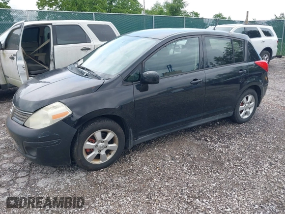 2009 Nissan Versa 1.8 S with VIN 3N1BC13E79L354341, listed as a IAAI auction lot 42079896 with 118,797 mi miles. Bid and sale history available at carsss.com. Image 2.
