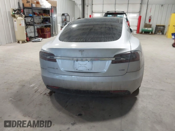 2017 Tesla Model S 100D with VIN 5YJSA1E23HF232059, listed as a IAAI auction lot 41394046 with 84,052 mi miles and . Bid and sale history available at DreamBid. Image 17.