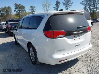 2023 Chrysler Voyager LX with VIN 2C4RC1CG7PR551071, listed as a IAAI auction lot 41889400 with 81,579 mi miles. Bid and sale history available at carsss.com. Image 3.