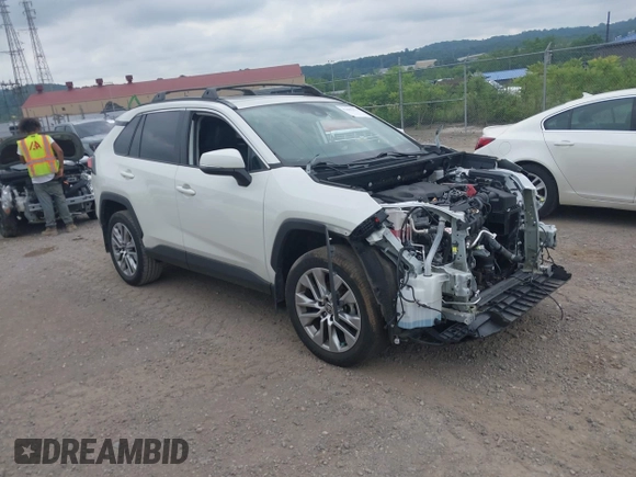 2022 Toyota RAV4 XLE Premium z VIN 2T3A1RFV4NW287421, wystawiony jako IAAI lot #42602371 z przebiegiem 59 294 mil mil oraz . Historia ofert i sprzedaży dostępna na DreamBid. Obrazek 1.